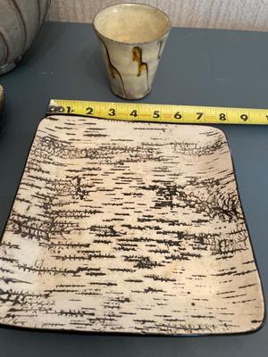 Four signed pottery pieces