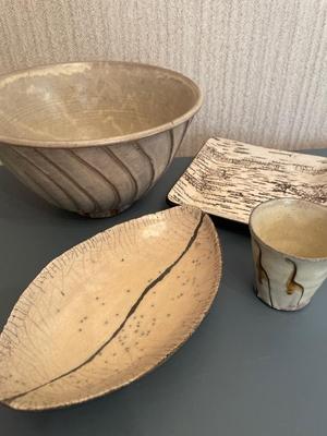 Four signed pottery pieces