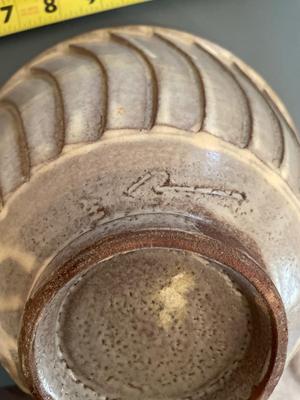 Four signed pottery pieces