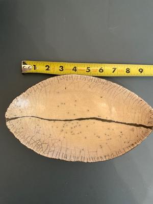 Four signed pottery pieces