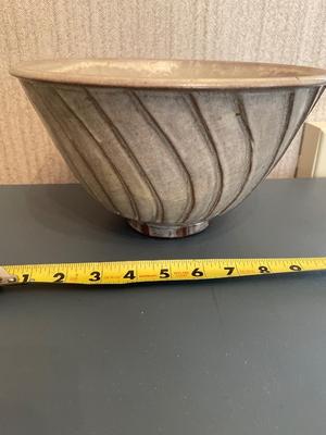 Four signed pottery pieces