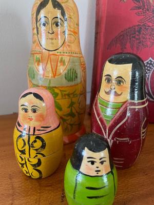 Vintage school, bell, Russian nesting dolls, and book