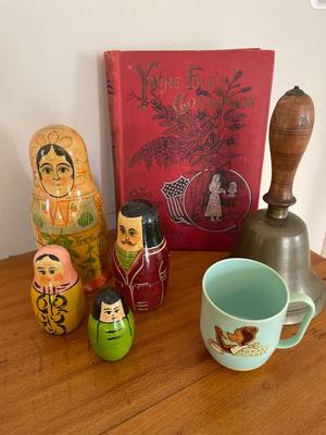 Vintage school, bell, Russian nesting dolls, and book