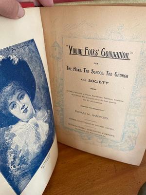 Vintage school, bell, Russian nesting dolls, and book