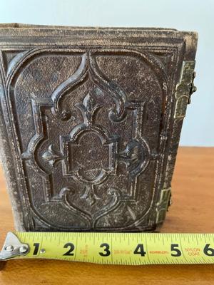 Small leather bound, raised embossed photo album