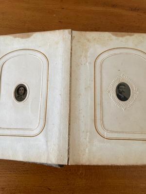Small leather bound, raised embossed photo album