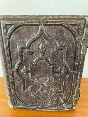 Small leather bound, raised embossed photo album