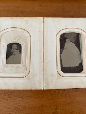 Small leather bound, raised embossed photo album