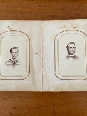 Small leather bound, raised embossed photo album