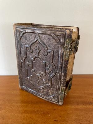 Small leather bound, raised embossed photo album