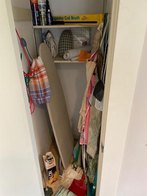 Closet of cleaning supplies