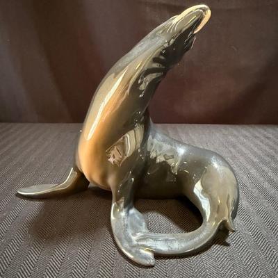 Two Bing & Grondahl Figurines: “Seal” and “Girl with Doll” (O-HS)