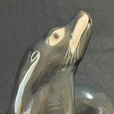 Two Bing & Grondahl Figurines: “Seal” and “Girl with Doll” (O-HS)