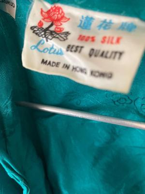 Two robes, Made in Hong Kong and Lands End