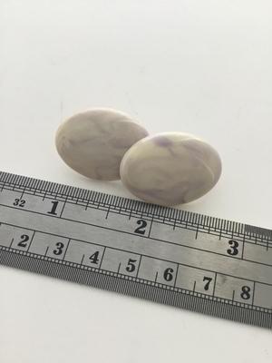 Beautiful marbel look oval clip on vintage earrings