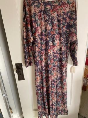 Variety of dresses and three piece outfits