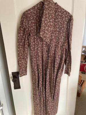 Variety of dresses and three piece outfits