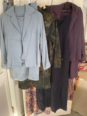 Variety of dresses and three piece outfits
