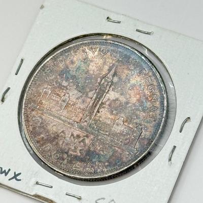LOT 549J: 1935-1964 Canadian One Dollar Coins (80% Silver)