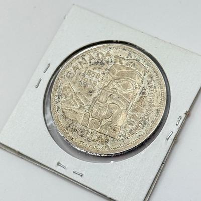 LOT 549J: 1935-1964 Canadian One Dollar Coins (80% Silver)