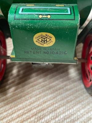 Two Japanese tin cars