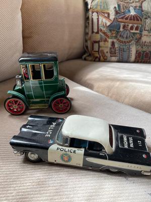 Two Japanese tin cars
