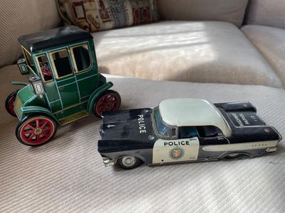 Two Japanese tin cars