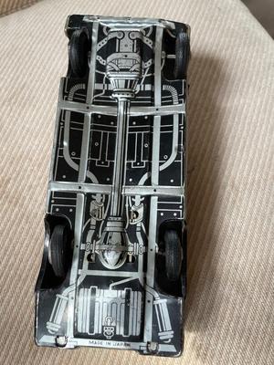 Two Japanese tin cars