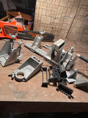 Electric chainsaw and portable vice bench