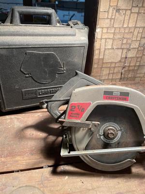 Craftsman skill saw with box of nails and screws