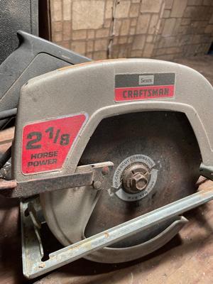 Craftsman skill saw with box of nails and screws