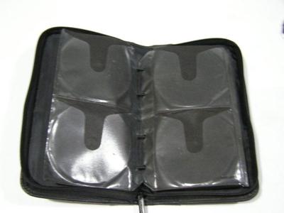 CaseLogic CD/DVD caddy, faux leather holds 48 discs total