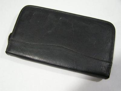 CaseLogic CD/DVD caddy, faux leather holds 48 discs total