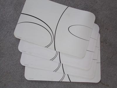 4 matching Corelle place mattes, reversible, easy clean vinyl