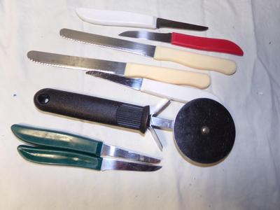 Lot of kitchen cutting tools.
