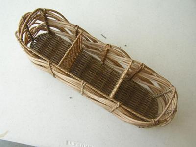 . Decorative long basket will hold 3 bottles or ??