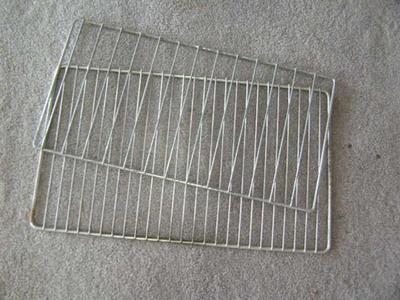 2 RV refrigerator wire rack shelves.