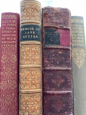 Two leather bound books and variety of vintage