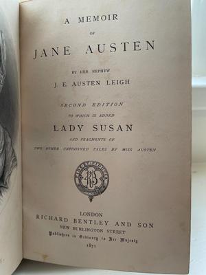 Two leather bound books and variety of vintage