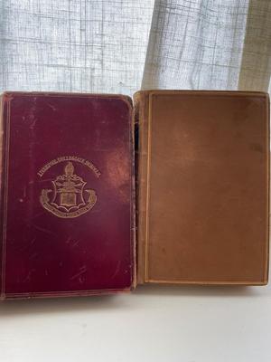 Two leather bound books and variety of vintage
