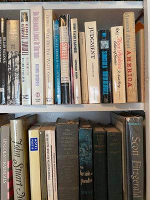 Books with various authors, including Faulkner and Fitzgerald