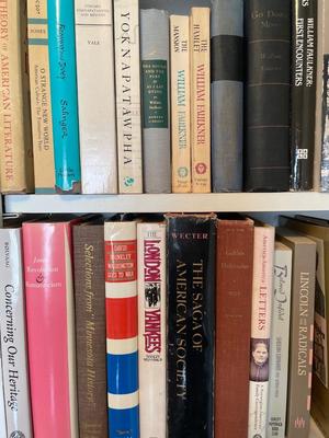 Books with various authors, including Faulkner and Fitzgerald