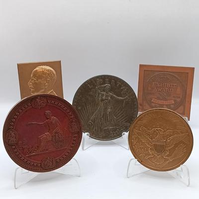 LOT 16: Set of 4 Metal Medallions with Coin Club Plaque- Philadelphia Centennial Exposition, Leslie M. Shaw & More