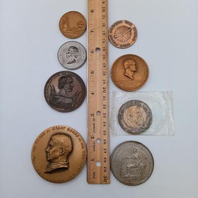 LOT 24: Set of 8 Metal Medallions- John Muir, Public Schools of Buffalo NY, Hugo Eckener & More
