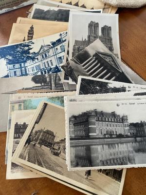 Statue, ashtray, vintage postcards