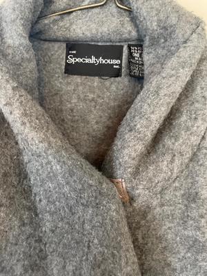 Women’s cape and sweater