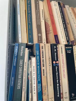 Three shelves of assorted books