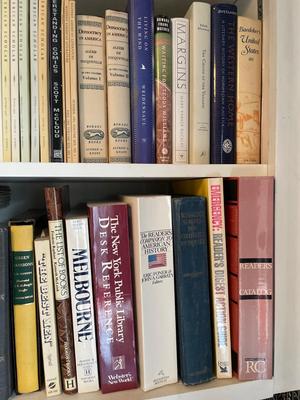 Three shelves assorted books