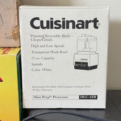 LOT 104K: Kitchen Collection: Santa Fe Quesadilla Maker, Pampered Chef Cookie Press, Cuisinart Toaster Oven Model TOB-40N (DL)