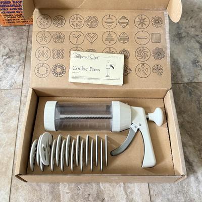 LOT 104K: Kitchen Collection: Santa Fe Quesadilla Maker, Pampered Chef Cookie Press, Cuisinart Toaster Oven Model TOB-40N (DL)